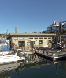 Comox Valley Marina office and facilities building viewed from the water.